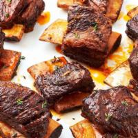 short ribs  · 6oz of marinated short ribs cooked in hibachi grill served with veggies, steam rice and home...