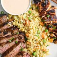 NY STEAK AND SALMON · 5oz ny steak and 5oz salmon cooked in hibachi grill comes with veggies, steam rice and homem...