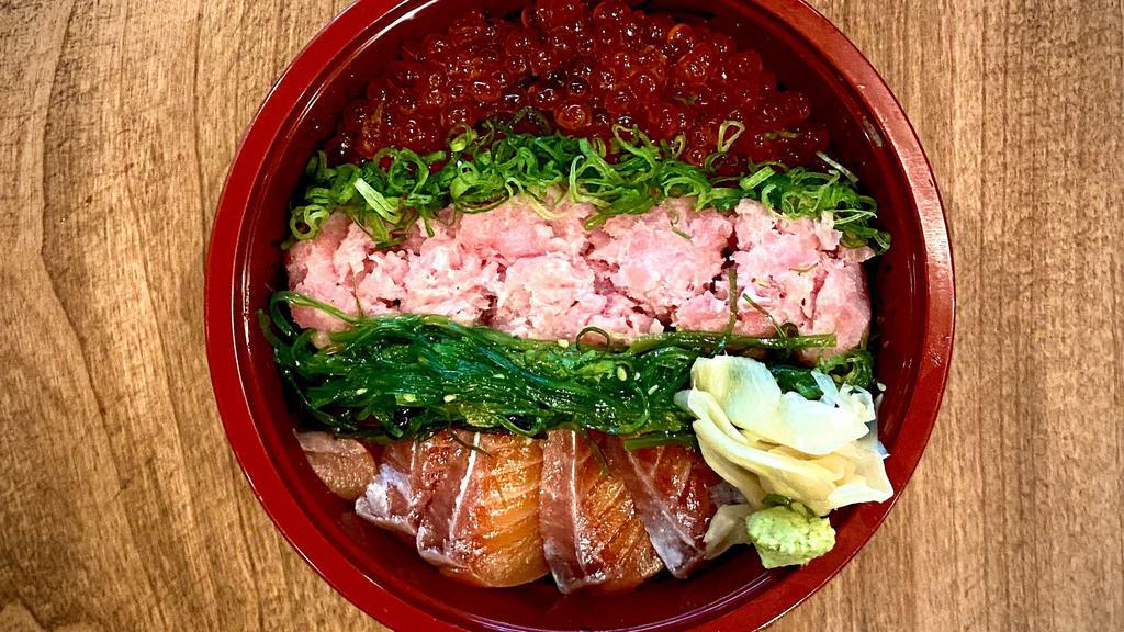 Sanshouku Don · 6 pc Salmon, Negitoro, soy marinated Ikura and Seaweed over Rice