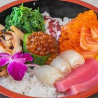 Chirashi Sushi · A bowl of rice topped with 10 pieces sashimi.