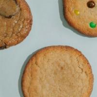 A Dozen Cookies + 1 · We will send you 4 Chocolate Chip, 3 Snickerdoodle, 3 M+M's, 3 Vegan Double Chocolate