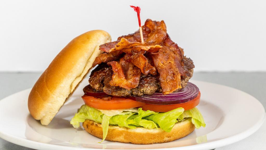 Bacon Burger · Fresh In-House Ground Angus Patty topped with a generous serving of Bacon. Served with Lettuce, Tomato, Onions, Mayo and Mustard on a Classic White Bun.