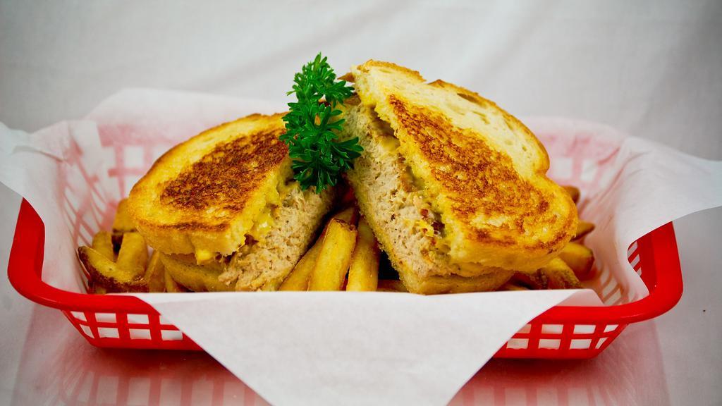 Tuna Melt · Scoop of Tuna Salad on Grilled Bread of your choice with Melted Cheese.