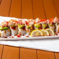 Dragon Roll (8 Pcs) · Shrimp tempura, crabmeat top with Avocado, unagi, unagi sauce, and sesame seed.