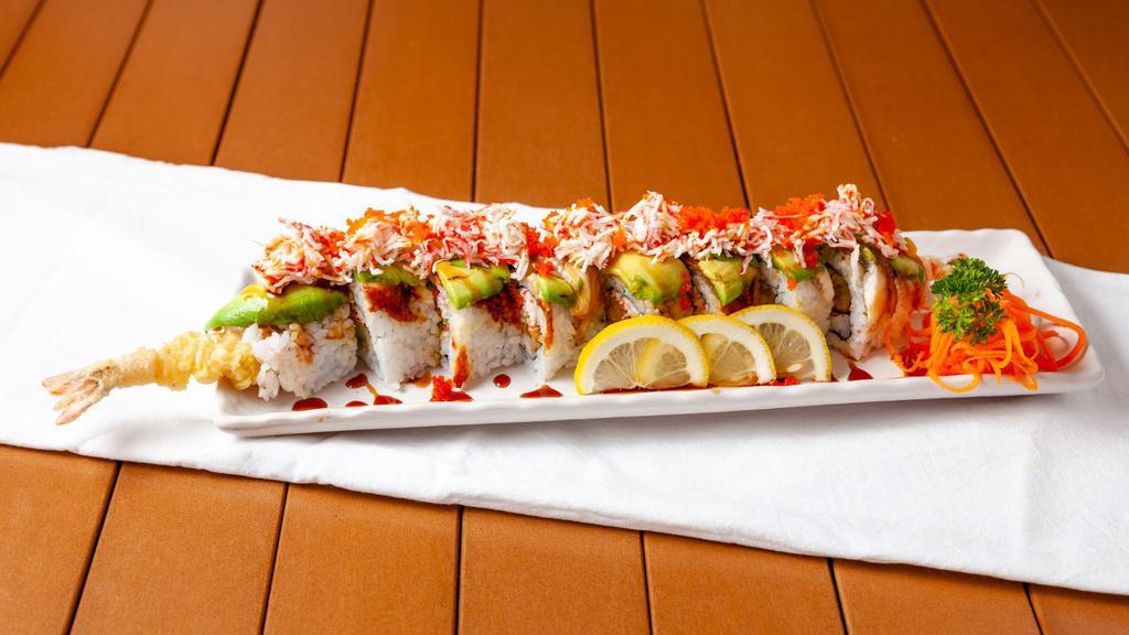Dragon Roll (8 Pcs) · Shrimp tempura, crabmeat top with Avocado, unagi, unagi sauce, and sesame seed.