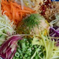 Crunchy Thai salad · Cabbage, Cilantro,  Tomatoes, Onions, Carrots, Sprouts and Cucumbers served with peanuts and...