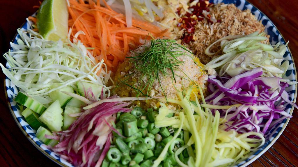 Crunchy Thai salad · Cabbage, Cilantro,  Tomatoes, Onions, Carrots, Sprouts and Cucumbers served with peanuts and peanut dressing. Options to add protein and carbohydrate.