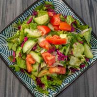11. House Salad · Vegan. Vegetarian. Romaine lettuce,tomatoes,cucumbers,onion, red cabbage, with olive oil and...