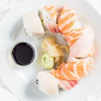 Rainbow Roll · Crab meat and avocado inside; assorted fish outside.