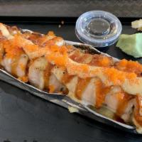 Lion King Roll · Crab meat and avocado inside; salmon outside with house special sauce