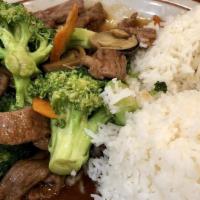 67. Broccoli Beef Over Rice · 