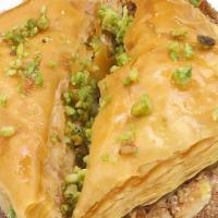 Baklava · Rich, sweet dessert pastry made of layers of filo filled with chopped nuts and sweetened and...