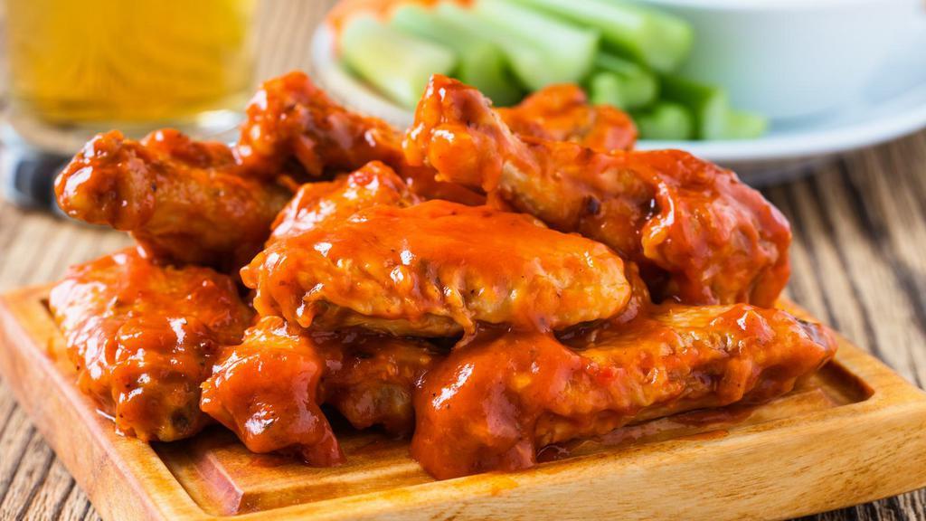 Buffalo Wings · Hot N' Crispy Chicken wings, tossed in Buffalo sauce and fried to perfection!