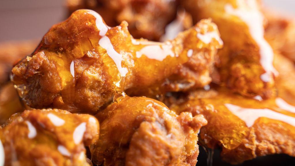 Honey Mustard Wings · Hot N' Crispy Chicken wings, tossed in Honey Mustard sauce and fried to perfection!