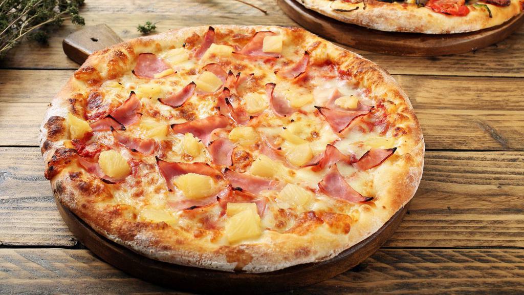 Hawaiian Pizza (Gluten Free) · Juicy ham and fresh pineapple on a fresh baked pizza.