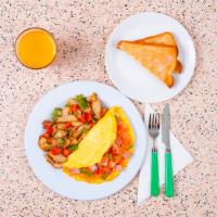 Western Omelette · Three egg omelette with melted cheddar, ham, onion, and bell peppers, served with an english...