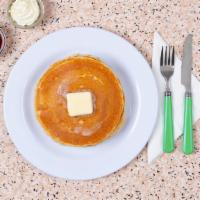 Pancakes · Two fluffy pancakes with syrup and butter.