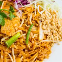 Pad Thai · Pan fried rice noodles with chicken, eggs, ground peanuts, bean sprouts and green onions.