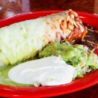 El Tri-Color Burrito · Super burrito covered with half red & half green enchilada sauce on top with cheese.
