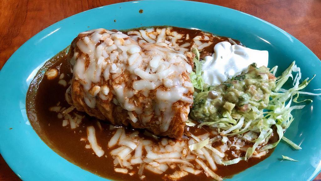 49ers Burrito · Super burrito covered with red enchilada sauce topped with cheese.