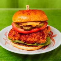 Spicy Fried Chicken Sandwich · Spicy crispy chicken breast with tomato, lettuce, onion, pickles, and mayo.