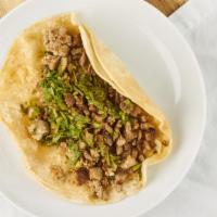 Regular Tacos · Choice of meat, onion, cilantro and salsa.