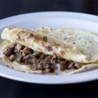 Mulitas · Meat served between two tortillas with cheese. Choice of meat.