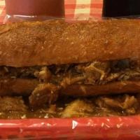 Torta Ahogada + Can Soda · Wet torta (beans, relish purple onion, tomato sauce) with your choice of meat  with a golden...