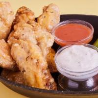 Garlic Parmesan Wings · Classic Bone-In Chicken Wings seasoned with garlic and parmesan