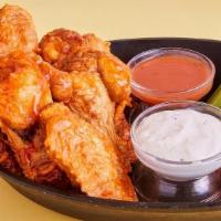 Atomic Wings · Classic Bone-In Chicken Wings, Our HOTTEST wing Sauce, it’s oh so addictive. If you like hea...