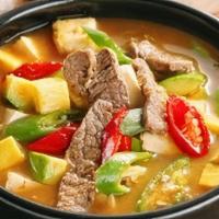 Denjang Jjigae · Soybean paste stew with vegetables and tofu. Served with steamed rice.