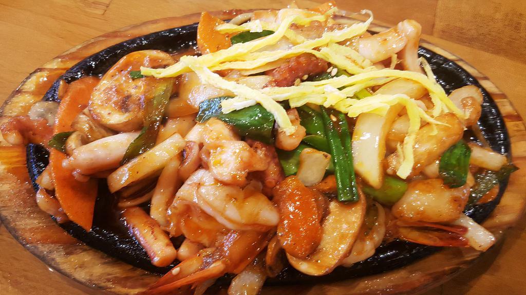 Spicy Squid · Spicy stir fried squid and vegetables.