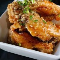 Stone Wings (3 Pieces) · Spicy and sweet tangy go chu jang sauce.