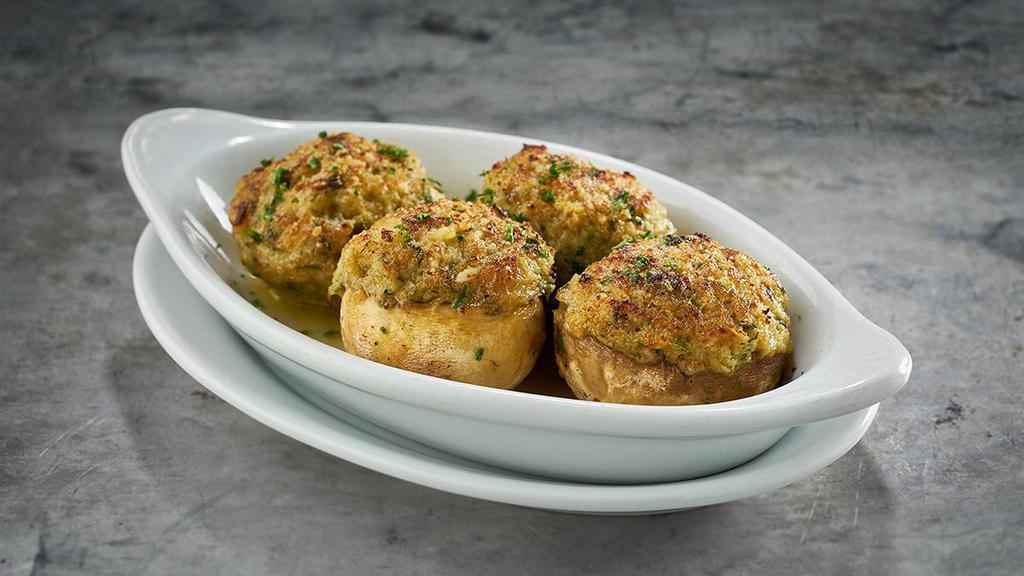Mushrooms Stuffed With Crabmeat  · broiled, topped with romano cheese