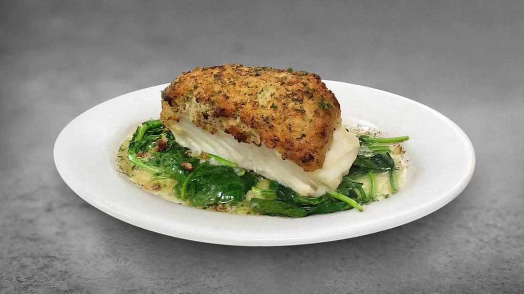 Garlic Crusted Sea Bass · tender fillet, topped with a panko garlic crust & lemon butter