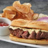 Steak Sandwich · sliced filet, horseradish cream, garlic bread, hand-cut potato chips