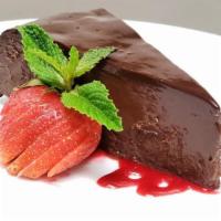 Chocolate Sin Cake · rich flourless cake, ganache, raspberry sauce | GF