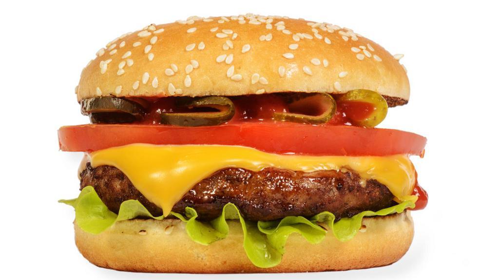 The Cheeseburger · Juicy beef patty with melted cheese, lettuce, tomatoes, pickles, onions, ketchup, and mustard on a sesame seed bun.