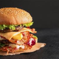 Double Cheeseburger with Bacon · Two juicy beef patties, crispy bacon, melted cheese, lettuce, tomatoes, pickles, onions, ket...