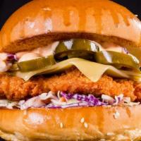 Jalapeño Crispy Chicken Burger · Fried chicken breast, chopped jalapeño, melted cheese, lettuce, tomatoes, pickles, onions, k...