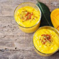 Mango Lassi · Refreshing yogurt drink with pureed mango.