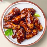 Blazing BBQ Wings · Fresh chicken wings breaded, fried until golden brown, and tossed in barbecue sauce.