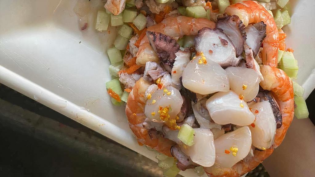 Chapito · Ceviche de pescado, pepino, camarón cocido, polpo y callo / Fish ceviche, cucumber, shrimp, octopus and scallop.