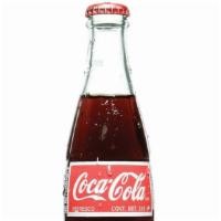 Coca cola · 355ml vidrio