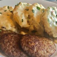 Country Biscuits & Gravy · 2 fresh-baked biscuits covered in our house-made gravy & served with 3 country sausage patti...