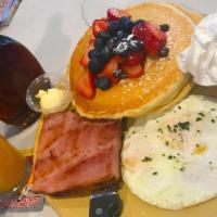 Crumbs Pancake Combo · 2 Buttermilk pancakes, 2 eggs & thick-cut applewood smoked bacon.
