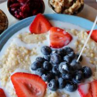 Steel Cut Oatmeal · Served with your choice of three of the following: milk, brown sugar, raisins, dried cranber...