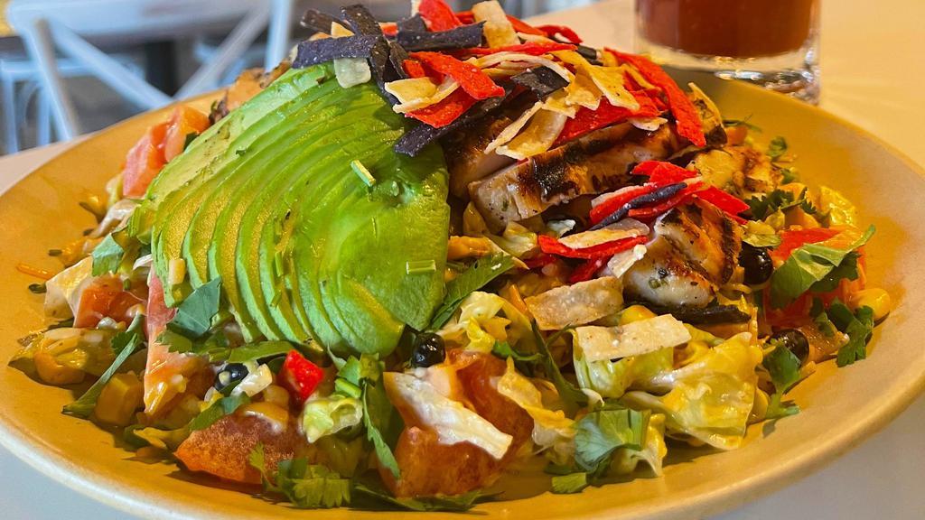 Santa Fe Salad · Blackened chicken, sliced avocado, cheddar & Jack cheese, black beans, corn, shredded lettuce, tomatoes, cilantro topped with tortilla strips. Served with chipotle ranch dressing.
