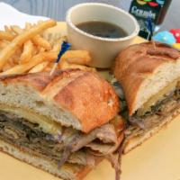 French Dip Au Jus · Slow-roasted Certified deli-sliced Angus® beef, Jack cheese, mushrooms & grilled onions serv...