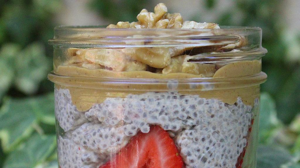 Chia Coconut Pudding · Refreshing, vegan, gluten free, keto-friendly creamy
deliciousness! Made with coconut & almond milk,
strawberries & blueberries. Comes in a reusable glass mason jar.